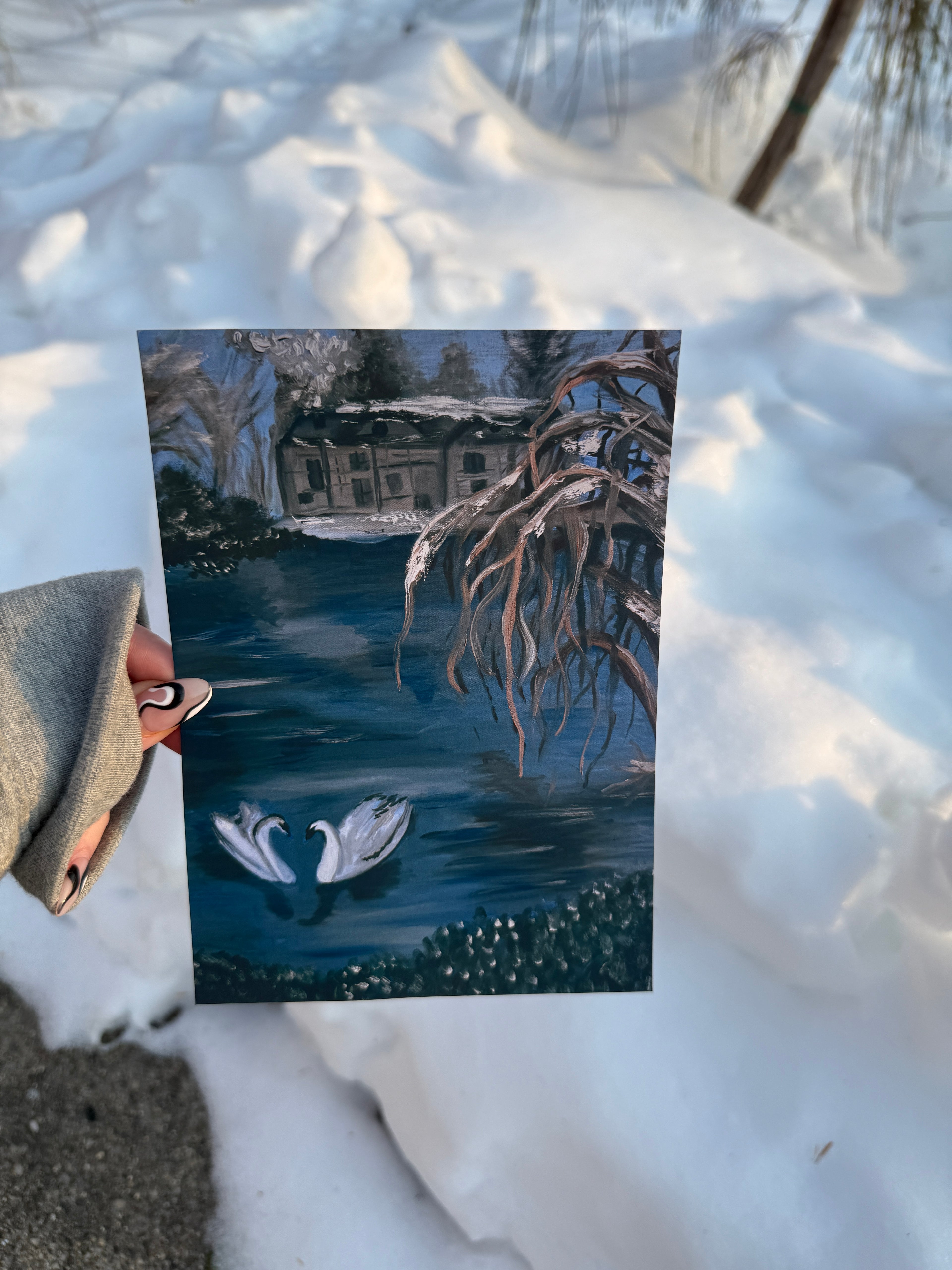 Winter scene with snow-covered ground and a small house in the background