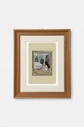 Framed artwork of a couple by a window on a white wall